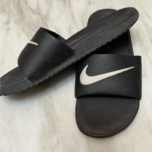 Nike youth size 4 black slides white swoosh